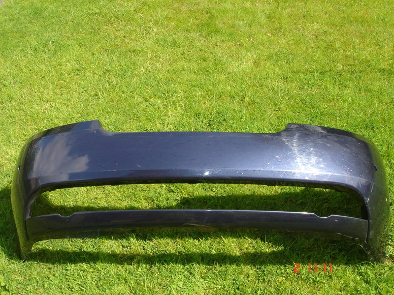 REAR BUMPER COVER USED