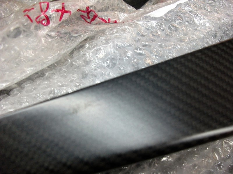 RIGHT HAND CARBON FIBRE DOOR HANDLE