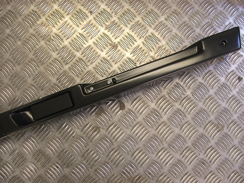 RIGHT HAND CARBON FIBRE DOOR HANDLE