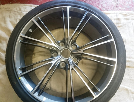 Image of FRONT WHEEL GRAPHITE DIAMOND TURNED 20IN WITH PIRELLI TYRE