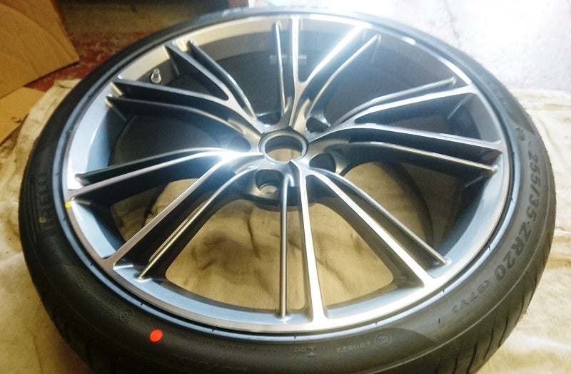 Image of FRONT WHEEL GRAPHITE DIAMOND TURNED 20IN WITH PIRELLI TYRE
