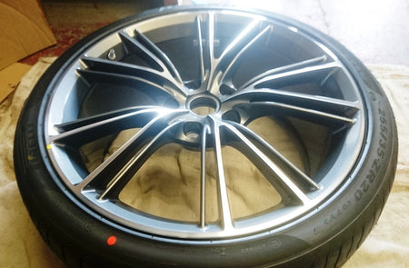 Image of FRONT WHEEL GRAPHITE DIAMOND TURNED 20IN WITH PIRELLI TYRE