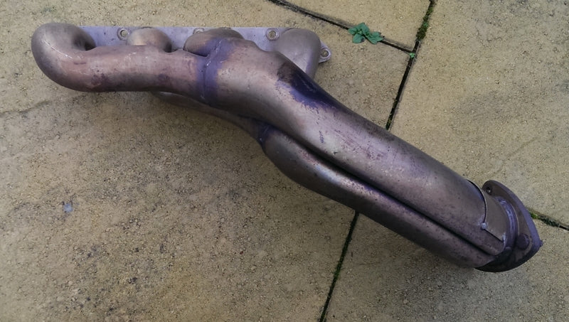 EXHAUST MANIFOLD - HEADER  LEFT