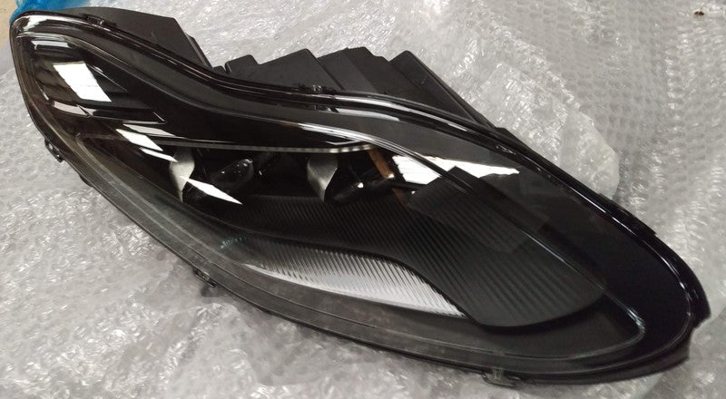 Image of FRONT HEADLIGHT LHD RIGHT HAND BLACK BEZEL