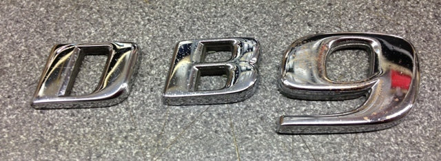DB9 CHROME BADGE