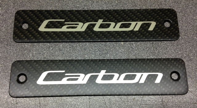 Image of FRONT SILL PLAQUE BADGE PAIR CARBON