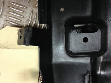 REAR BUMPER BRACKET COVER LEFT HAND
