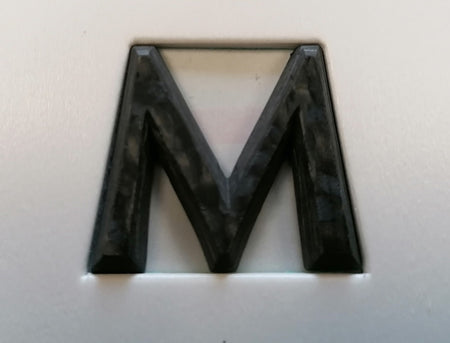 Image of REAR ASTON MARTIN SCRIPT BADGE - CARBON