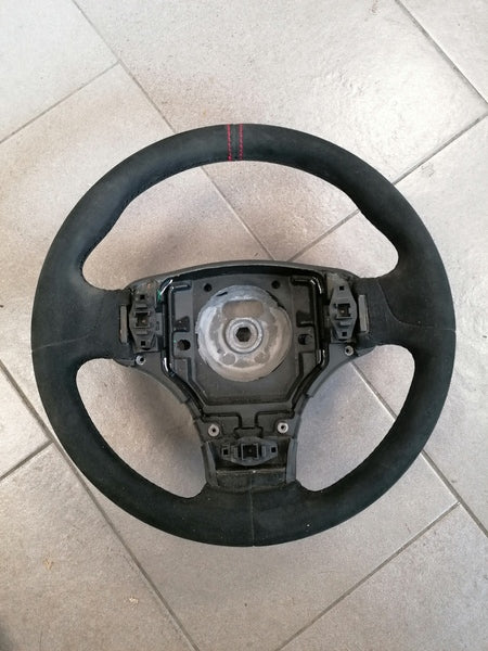 Image of ALCANTARA STEERING WHEEL WITH DOUBLE RED STITCHING