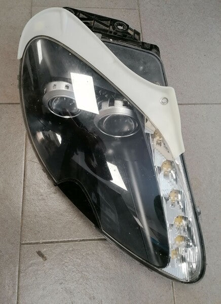 Image of RIGHT HAND HEADLAMP TRIM