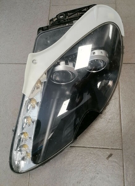 Image of LEFT HAND HEADLAMP TRIM
