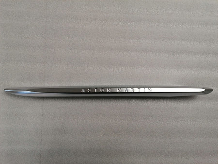 Image of LEFT FRONT WING FENDER CHROME STRAKE WITH THE ASTON MARTIN INSCRIPTION