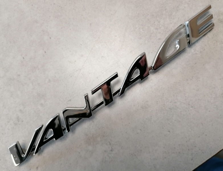 Image of REAR CHROME VANTAGE BADGE