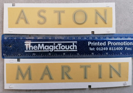 Image of REAR ASTON MARTIN LARGE SCRIPT BADGE - BLACK