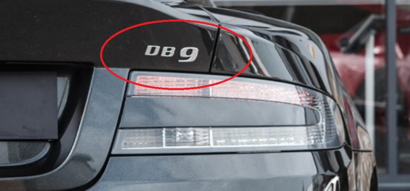 DB9 CHROME SELF ADHESIVE BADGE